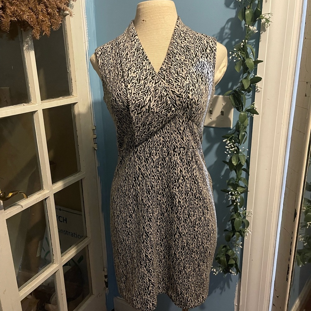 Black and White Midi Sheath Dress with Halter Neckline and Sleeveless Design